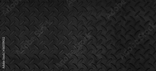 Steel plate pattern Manhole cover of black dark color ,Black dark grey Checker Plate abstract floor metal stanless background stainless pattern surface