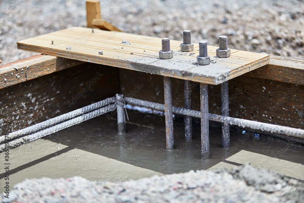 Anchor Bolt and Steel Rods in Wet Cement Stock Photo Adobe Stock