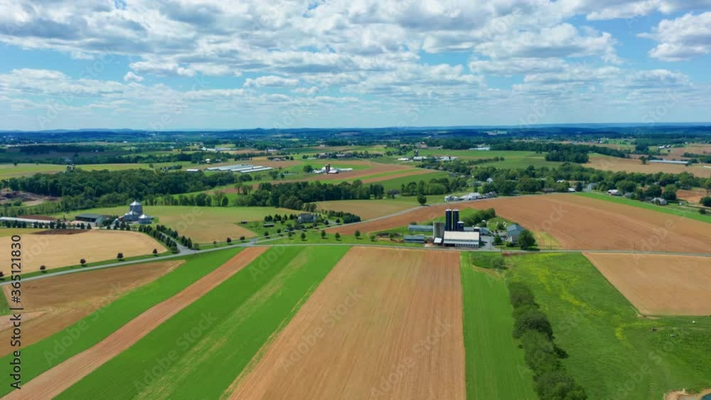 Aerial timelapse hyperlapse, rural America farmland, cloud ceiling during spring, motion movement, ag industry Aerial timelapse hyperlapse, rural America farmland, cloud ceiling during spring, motion movement, ag industry
