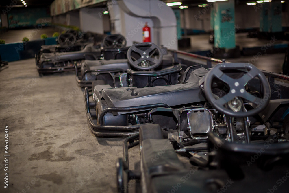 A number of small race cars ready for the race. A number of small race cars ready for the race.