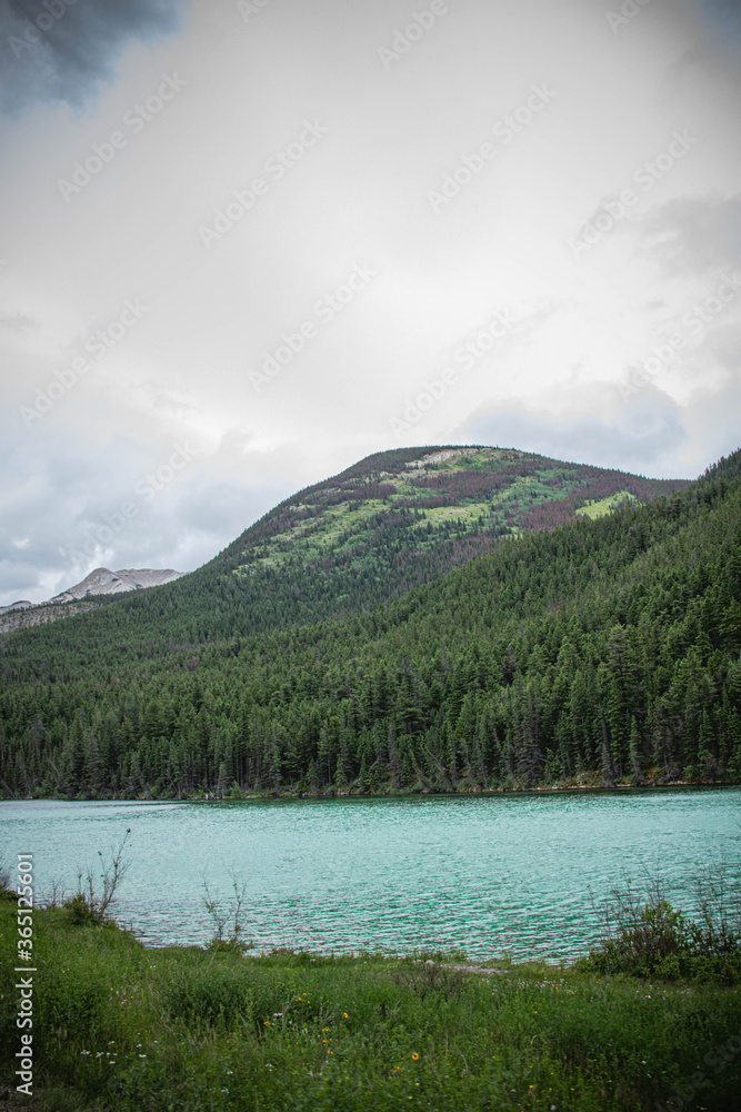 mountain landscape with lake and mountains