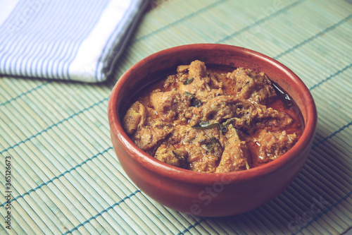 Foto Indian Home made Chettinad country chicken curry