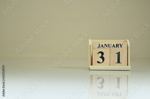 January 31, Number cube with the reflection on the ground.