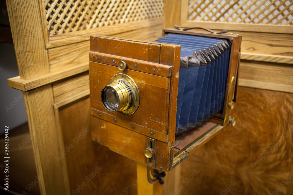 Vintage wooden camera in the interior. Old camera.