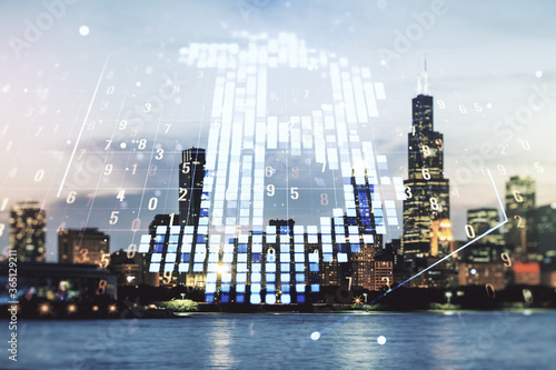 Double exposure of creative Bitcoin symbol hologram on Chicago city skyscrapers background. Cryptocurrency concept © Pixels Hunter
