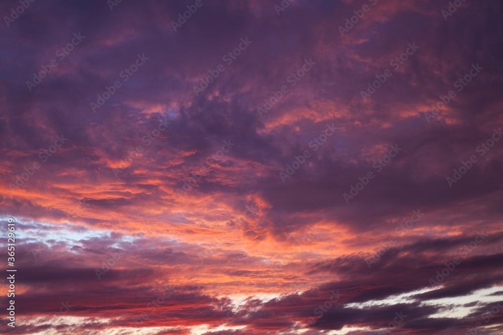 red sky with clouds