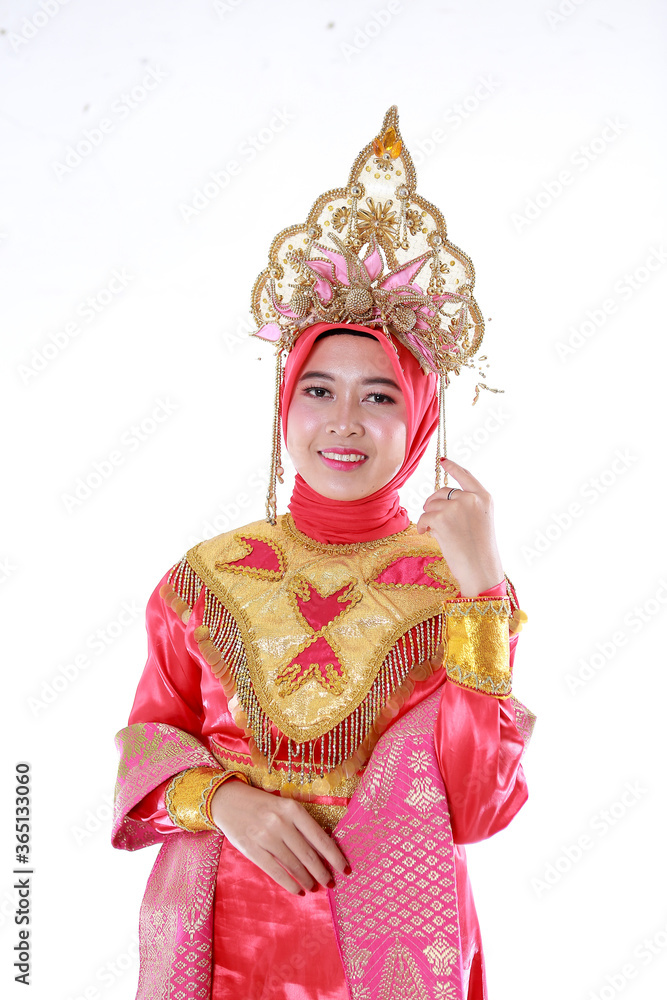 Beautiful smiling Asian girl wearing a set of modern traditional clothes, the traditional female outfits originated from Indonesia. Indonesian Women isolatedd white background