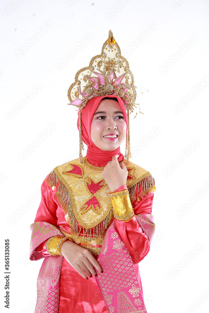 Beautiful smiling Asian girl wearing a set of modern traditional clothes, the traditional female outfits originated from Indonesia. Indonesian Women isolatedd white background Beautiful smiling Asian girl wearing a set of modern traditional clothes, the traditional female outfits originated from Indonesia. Indonesian Women isolatedd white background