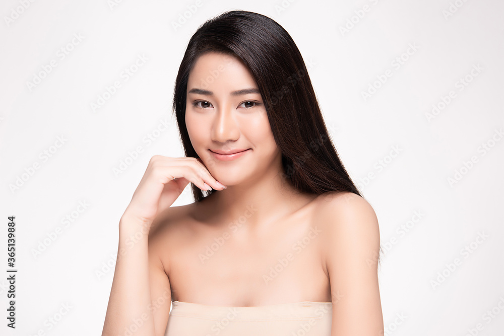 Beauty face. Smiling asian woman touching healthy skin portrait. Beautiful happy girl model with fresh glowing hydrated facial skin and natural makeup on white background, Beauty face. Smiling asian woman touching healthy skin portrait. Beautiful happy girl model with fresh glowing hydrated facial skin and natural makeup on white background,