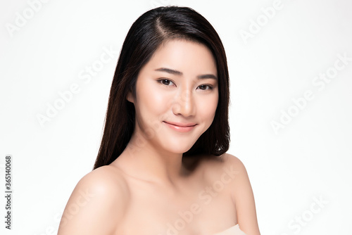 Beautiful smiling young asian woman with clean skin, natural make-up, on white background,