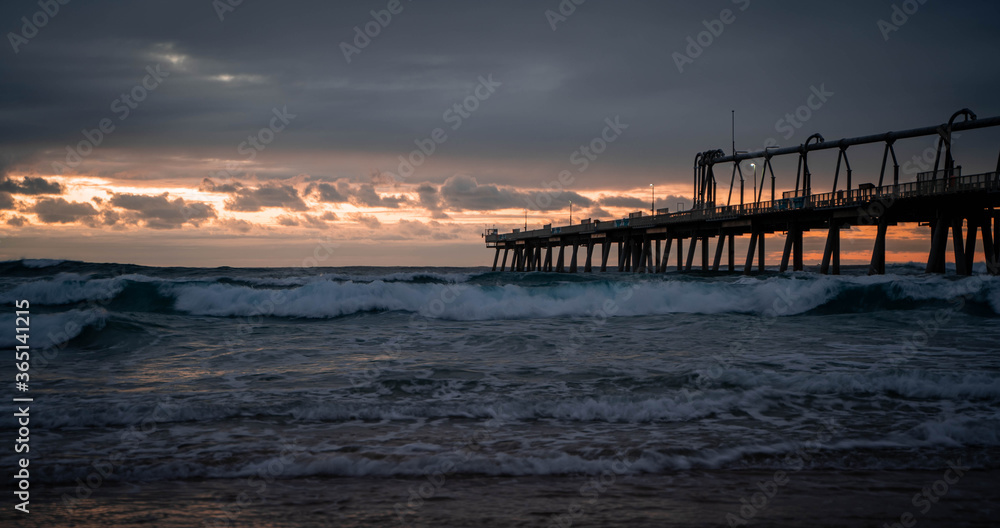 Ocean sunrise at the pier