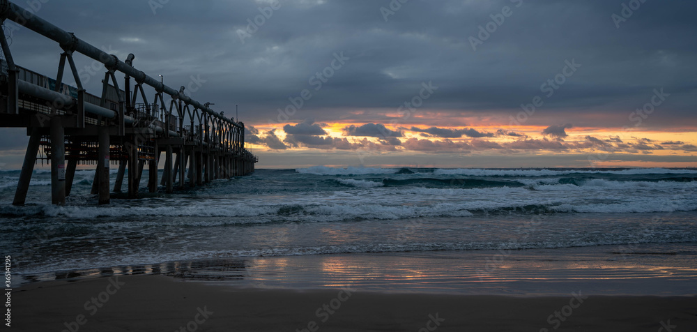 Ocean sunrise at the pier