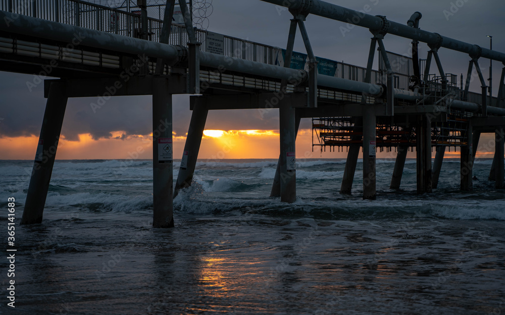 sunrise with clouds at the pier