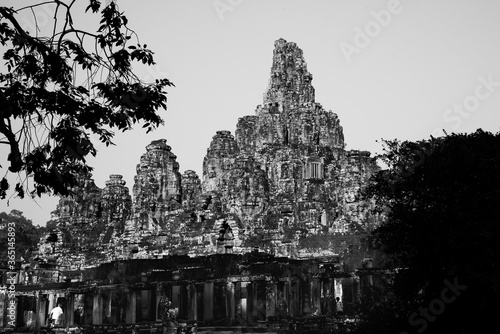 Towers of a prasat with the face of lokeshvara, with the facial features of Jayavarman VII in the archaeological place of the bayon in siam reap, cambodia
 photo