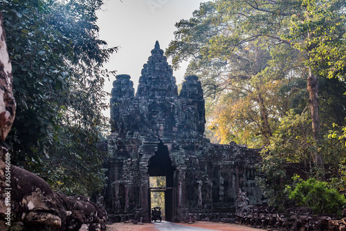 Towers of a prasat with the face of lokeshvara, with the facial features of Jayavarman VII in the archaeological place of the bayon in siam reap, cambodia
 photo