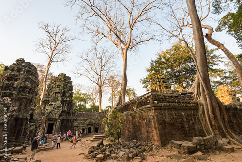 Towers of a prasat with the face of lokeshvara, with the facial features of Jayavarman VII in the archaeological place of the bayon in siam reap, cambodia
 photo