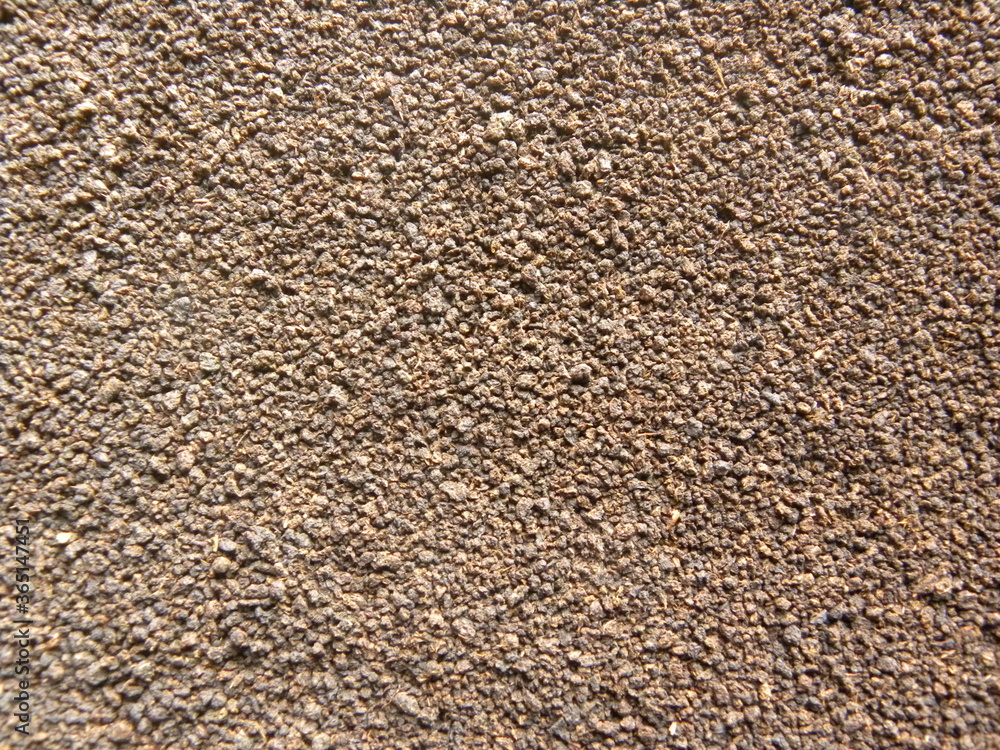 Brown color ground dry tea leaves Brown color ground dry tea leaves