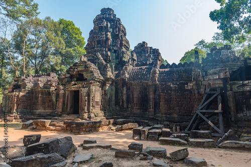 Towers of a prasat with the face of lokeshvara, with the facial features of Jayavarman VII in the archaeological place of the bayon in siam reap, cambodia photo