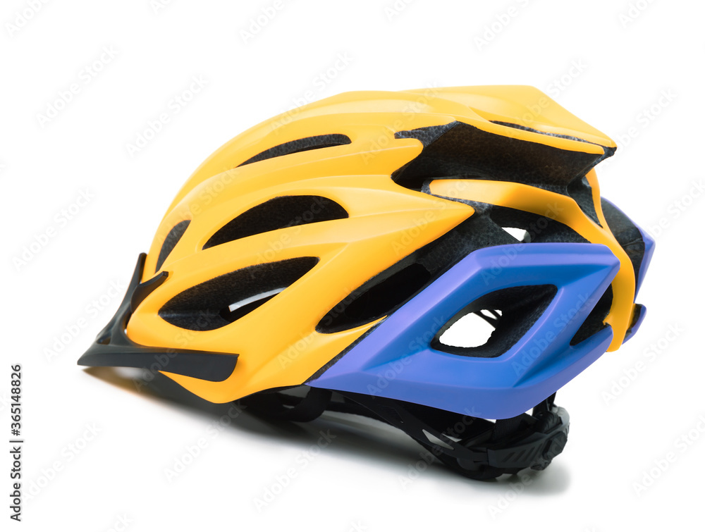 Fototapeta premium Yellow and blue bicycle helmet isolated on white