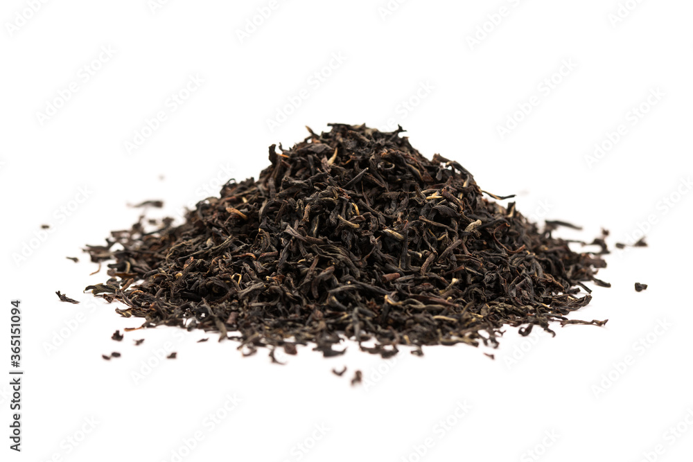 Leaves of black premium dry tea on a white background Leaves of black premium dry tea on a white background