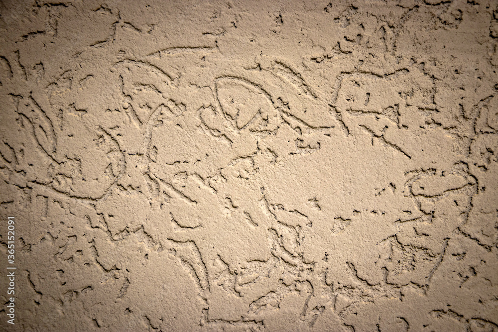 Texture of a concrete wall covered with decorative plaster Texture of a concrete wall covered with decorative plaster