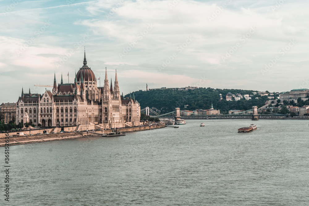 The huge and amazing Parliament of Budapest seen from far one of the sides, Hungary