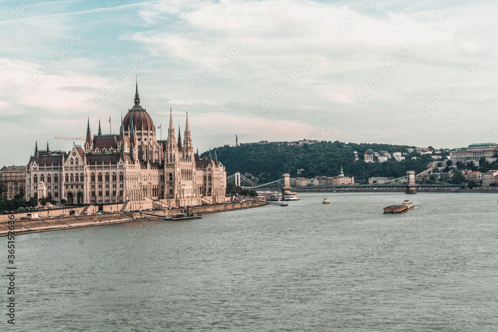 The huge and amazing Parliament of Budapest seen from far one of the sides, Hungary The huge and amazing Parliament of Budapest seen from far one of the sides, Hungary