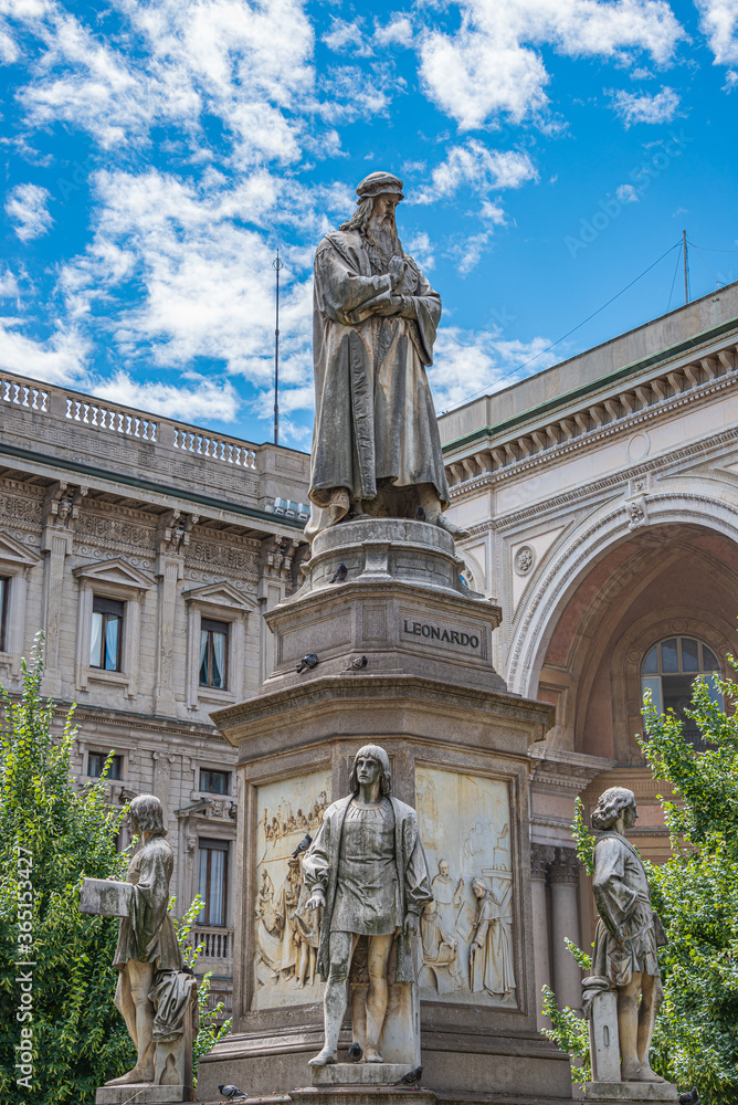 Milan, Italy – July 9, 2014: Details of monument of famous painter Leonardo and his journeymen near the Cathedral of Milano, at Milan’s historical downtown, Italy, summer time, details.