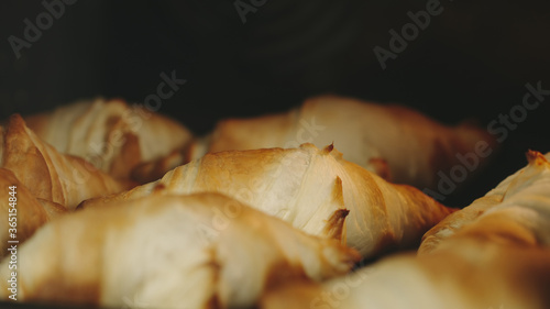 Hot croissants in oven