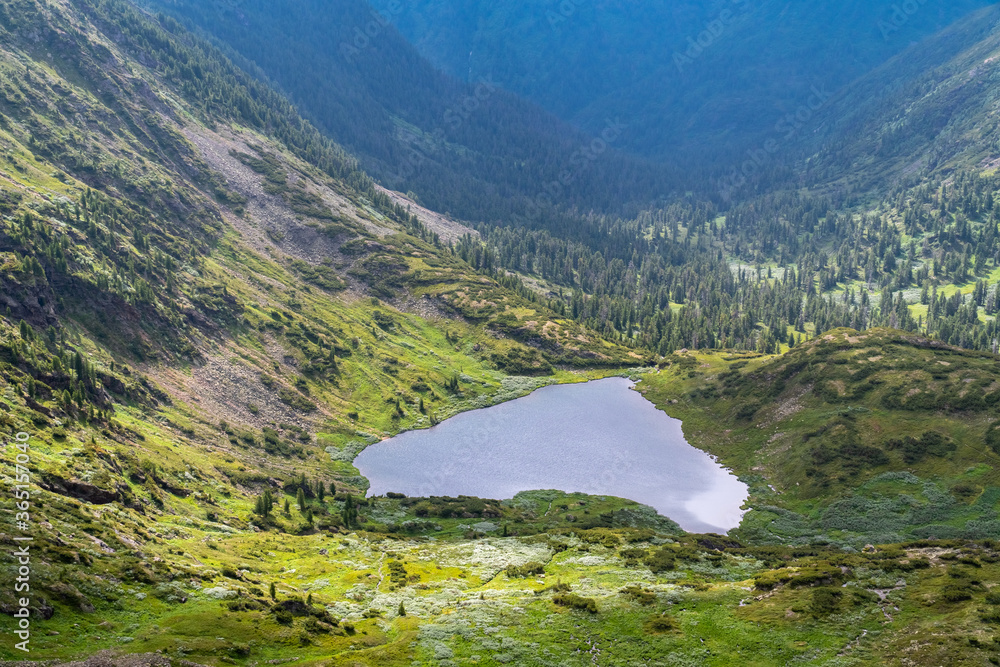 Fototapeta premium Heart Lake under Chersky peak in the Khamar-Daban mountains