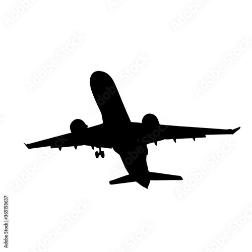 silhouette of the aircraft coming in to land with the landing gear released