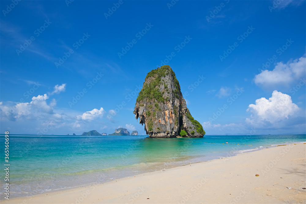 photo taken on a wide angle lens, the azure sea on the bounty beach in Thailand, the transparent sea, a picturesque island, paradise pleasure, travel and vacation, background for postcards