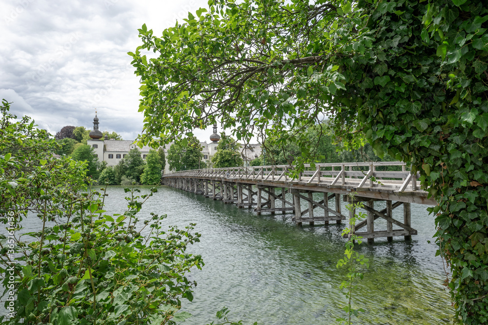 Wooden bridge between the castle named Ort and the city Gmunden. Austria