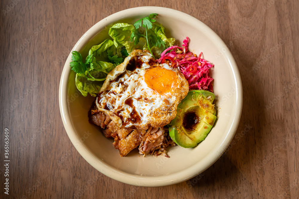 rice with fried chicken teriyaki sauce and avocado and fried egg rice with fried chicken teriyaki sauce and avocado and fried egg