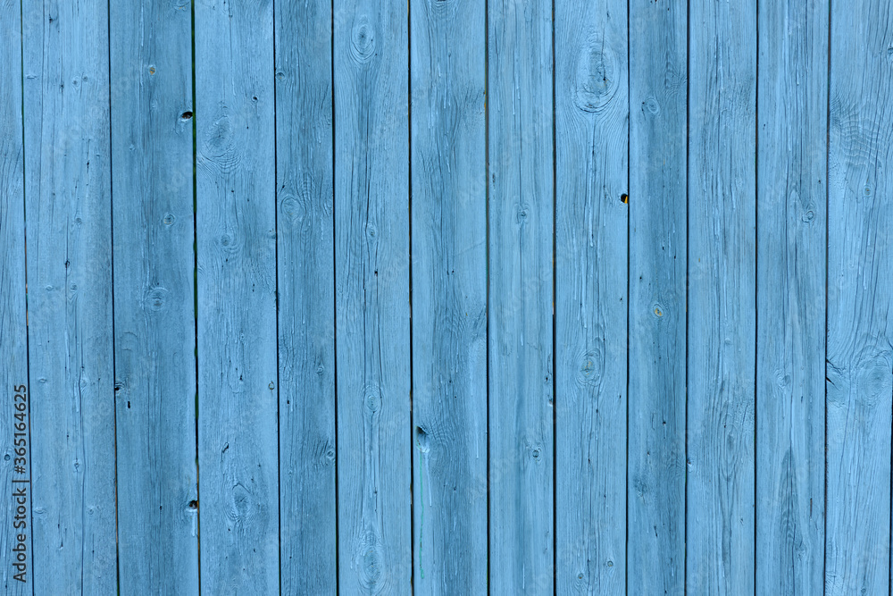Blue wooden background, old age effect. Old boards painted light blue, close-up. Blue wooden background, old age effect. Old boards painted light blue, close-up.