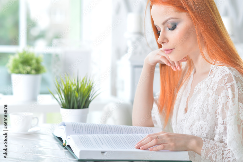 Young attractive woman with book in the morning Young attractive woman with book in the morning