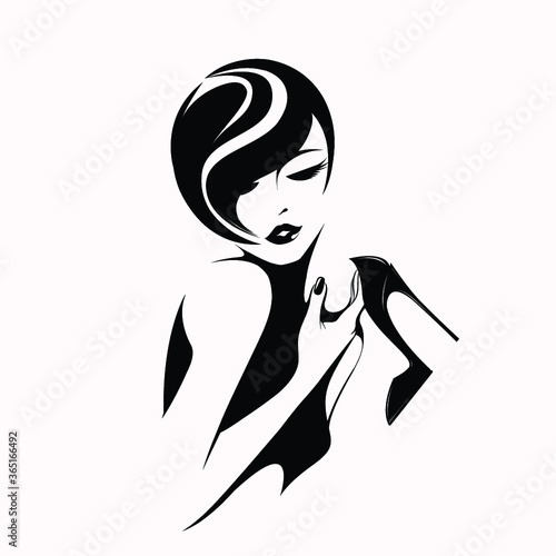 Beautiful woman with elegant hairstyle, manicure and makeup, showing a stiletto shoe.Fashion, cosmetics, beauty salon and hair studio icon.Young lady face.High heels.