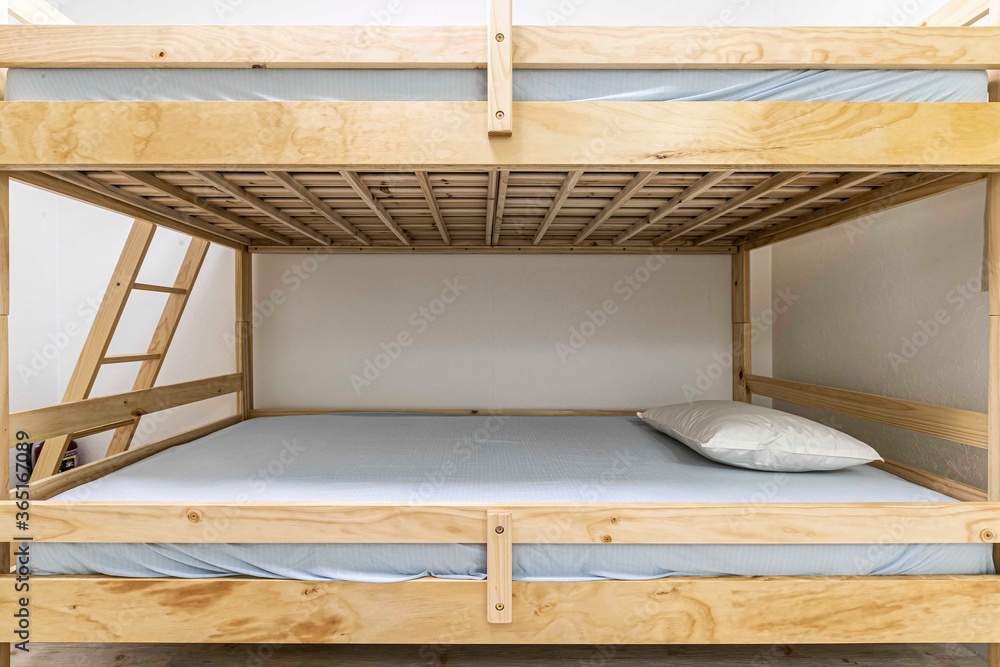 Bunk bed and mattress in guest house room Bunk bed and mattress in guest house room