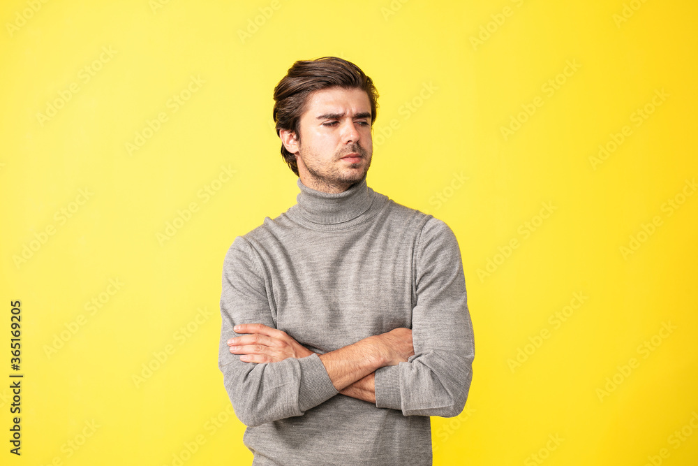 single man on yellow background single man on yellow background