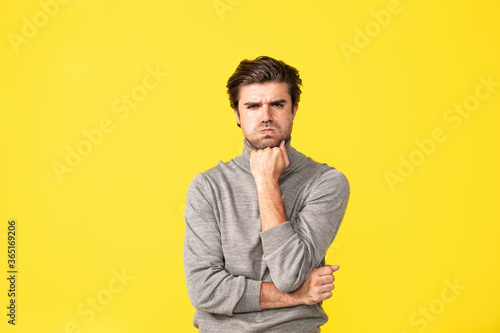 single man on yellow background