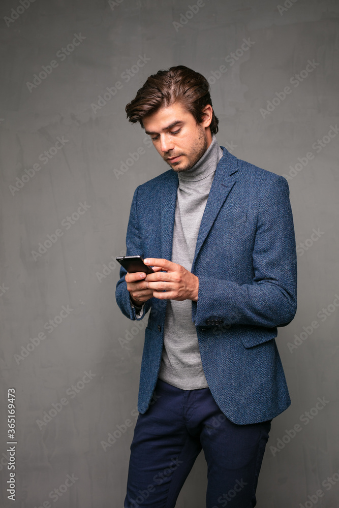elegant stylish man on grey elegant stylish man on grey
