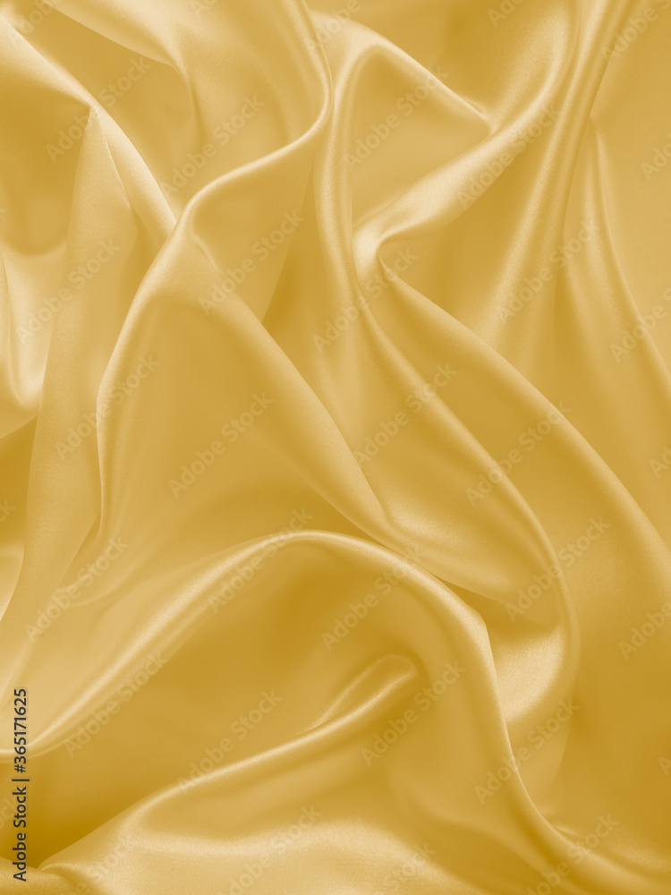 Beautiful smooth elegant wavy light yellow satin silk luxury cloth fabric texture, abstract background design. Copy space. Wedding, engagement concept. Beautiful smooth elegant wavy light yellow satin silk luxury cloth fabric texture, abstract background design. Copy space. Wedding, engagement concept.