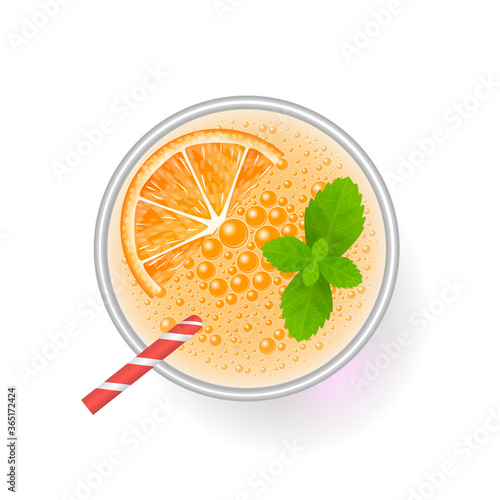 A glass of fresh orange juice. Top view. Drink, cocktail, alcohol in the glass. View from above.