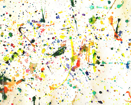 coloured spots of watercolor on a white paper background