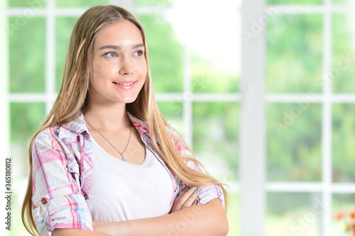 Portrait of a beautiful young woman posing Free Download Portrait of a beautiful young woman posing - GFXLoad