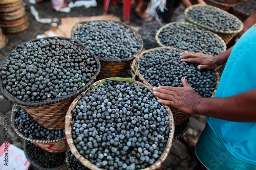 Baskets full of fresh acai fruits coming from the deep amazon forest are seen for sell at Ver O Peso public market in Belem do Para, north of Brazil.
