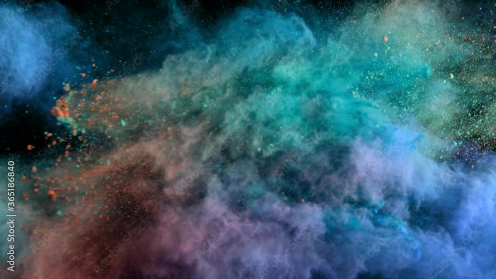Super slow motion of coloured powder collision isolated on black background. Filmed on high speed cinema camera, 1000fps. Super slow motion of coloured powder collision isolated on black background. Filmed on high speed cinema camera, 1000fps.
