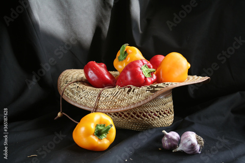 Fototapeta Naklejka Na Ścianę i Meble -  man holding basket of vegetables