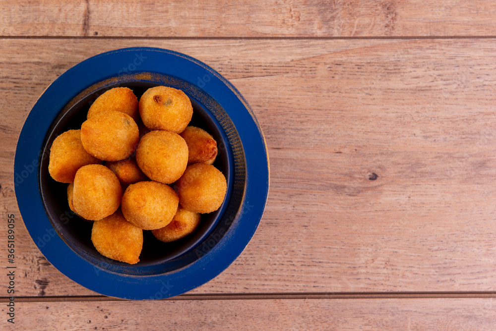 traditional Brazilian fried snack made with chicken known as traditional Brazilian fried snack made with chicken known as