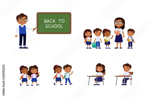 Dark skin schoolchildren and teachers. Cheerful classmates standing near blackboard. Children go to school, sit at  schooldesk. Greeting on school chalkboard. The concept of back to school. 